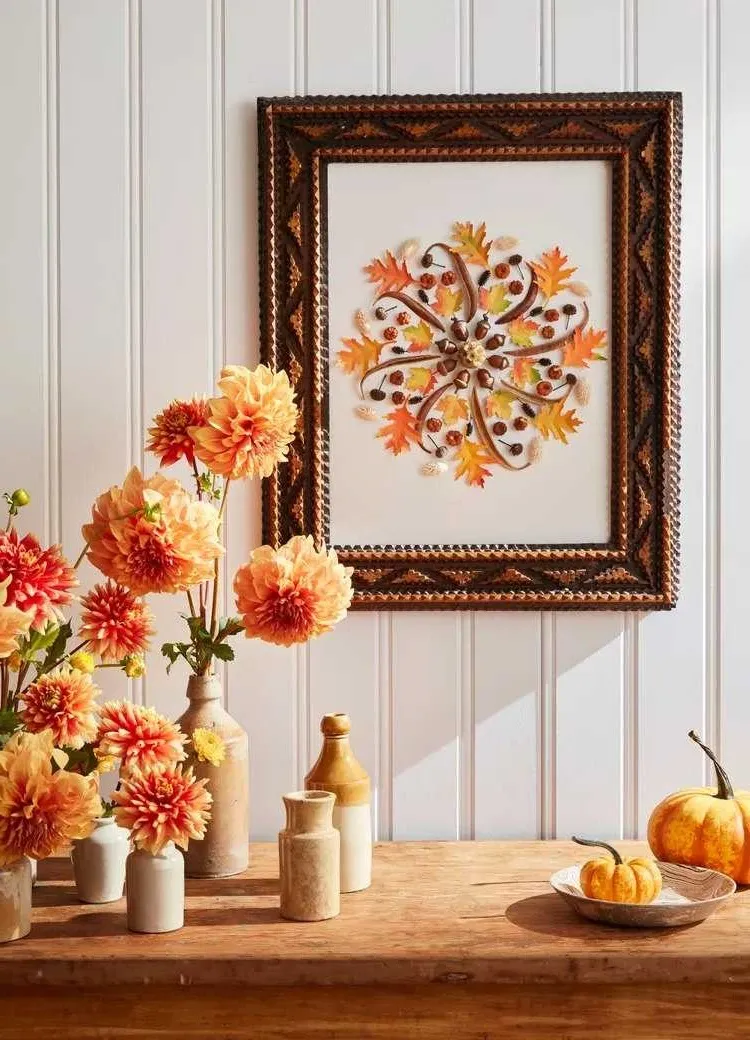 autumnal motifs on the wall picture and seasonal flowers as autumn decoration 2023 for living rooms in rustic look