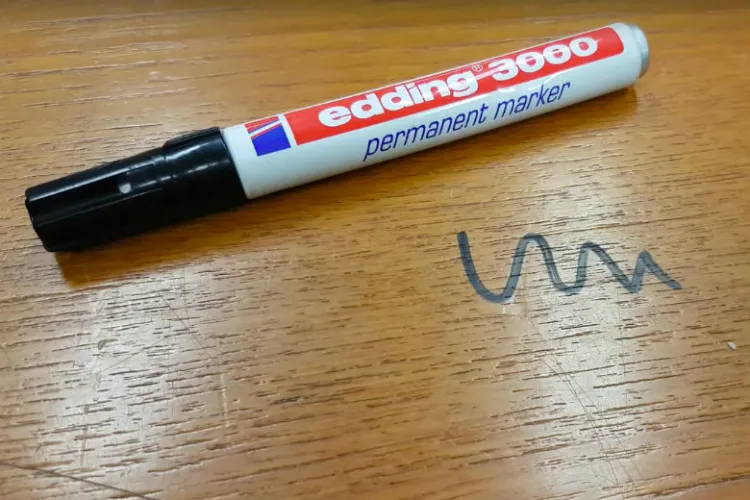 best way to get permanent marker off a wood table