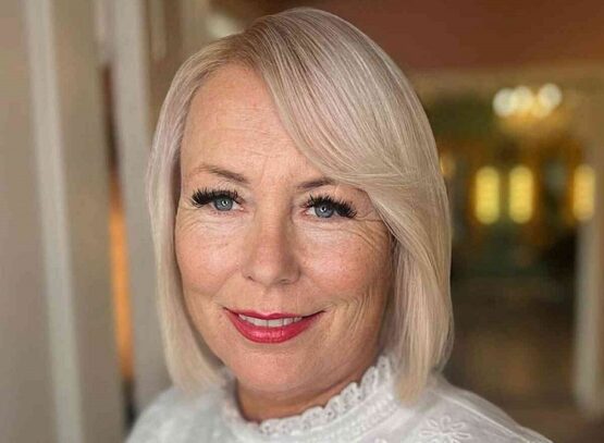 blonde bob with side swept bangs for women over 60 with thin hair wash and wear haircut