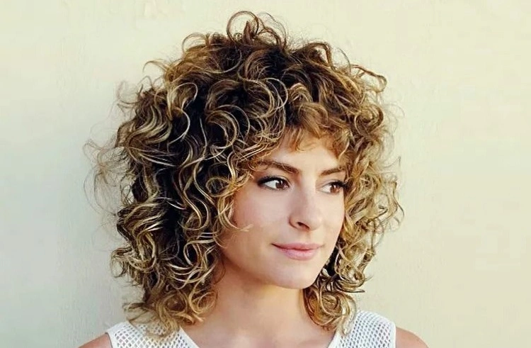 curly medium length bob hairstyles with bangs 2023