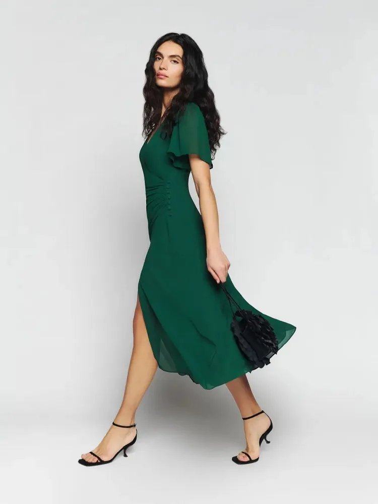flowy green v neck long fall wedding guest dress idea with sleeves