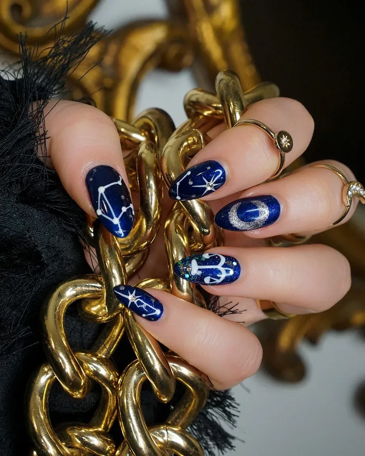 glitter navy blue nails celestial design libra constellation zodiac sign symbol scales