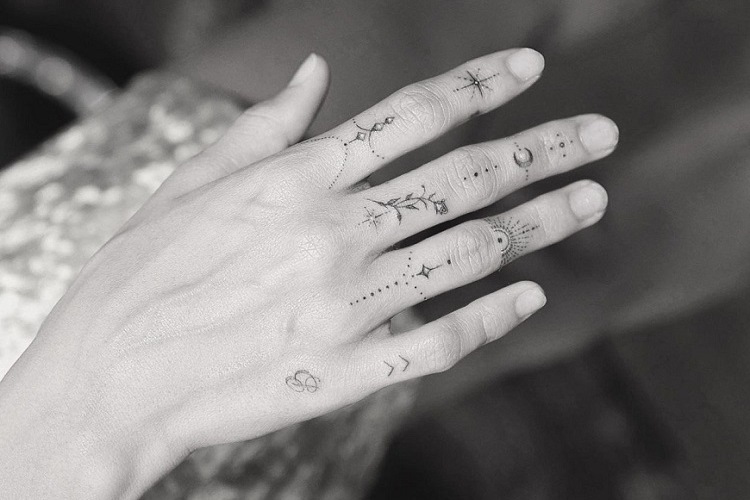 hailey bieber hand tattoo discreet ink