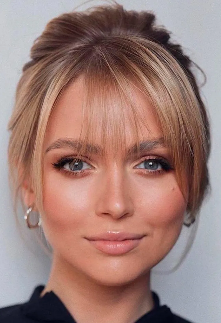hair bun with bangs for women with thinning hair