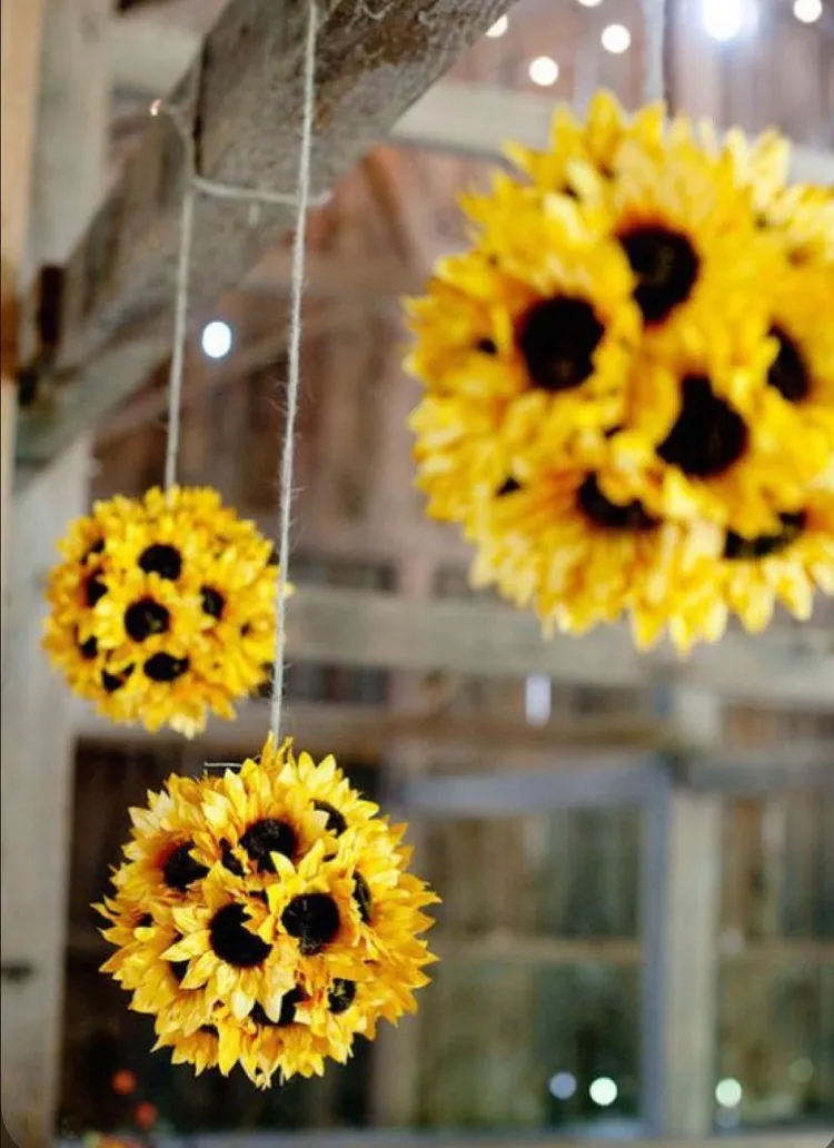 handing decoration with sunflowers wedding fall 2023