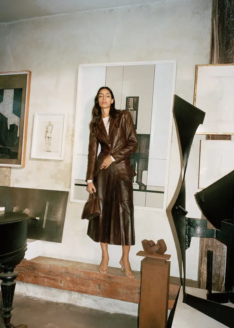 how to build a quiet luxury capsule wardrobe for fall 2023 long leather skir piece