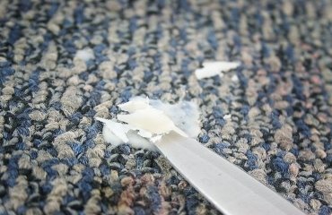 how to clean candle wax out of a carpet