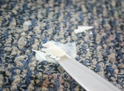 how to clean candle wax out of a carpet