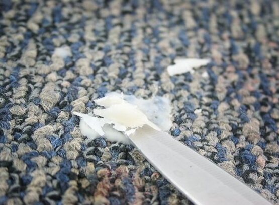 how to clean candle wax out of a carpet