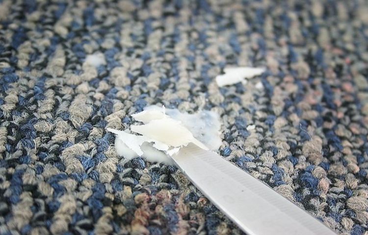 how to clean candle wax out of a carpet