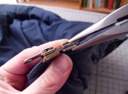how to fix a broken zipper at home remove the broken hook and replace with a new one