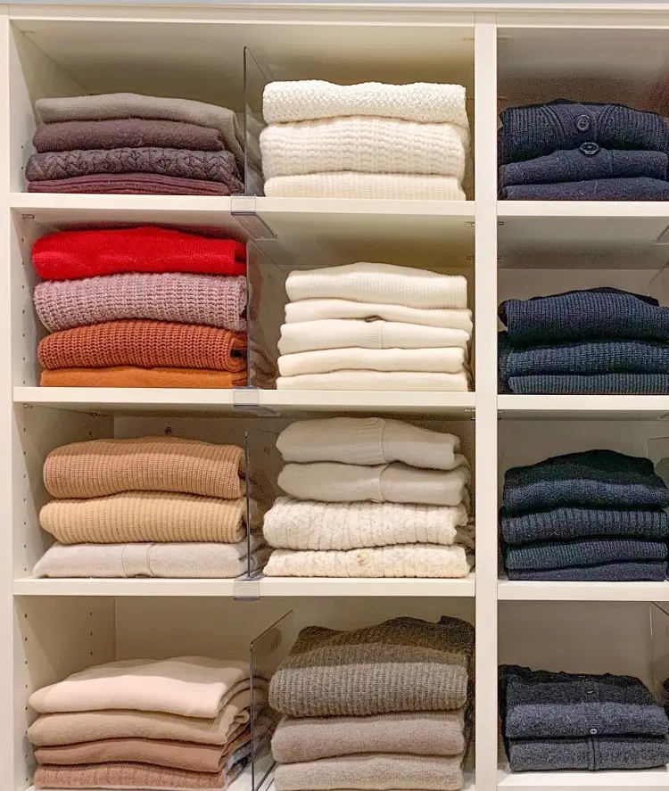 how to fold thick sweaters to save space