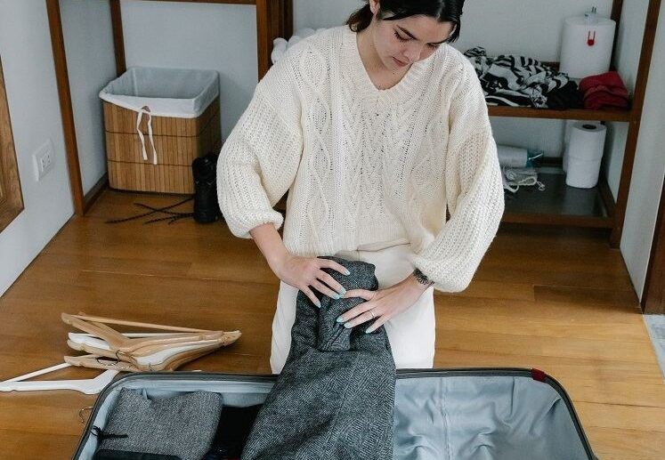 how to pack jackets in a suitcase easy save space methods