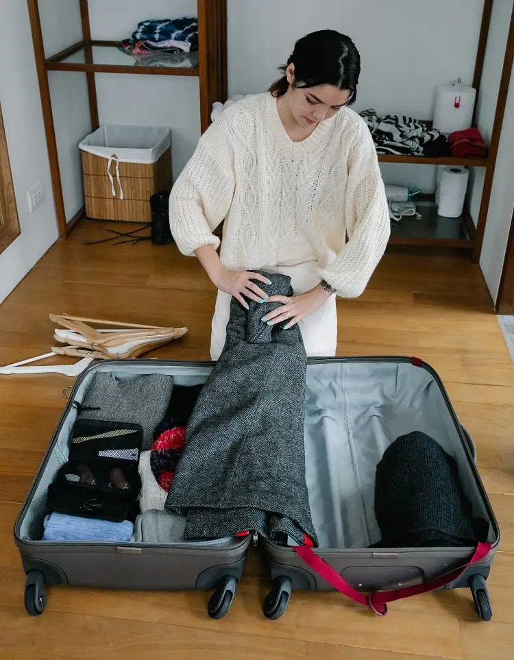 how to pack jackets in a suitcase easy save space methods