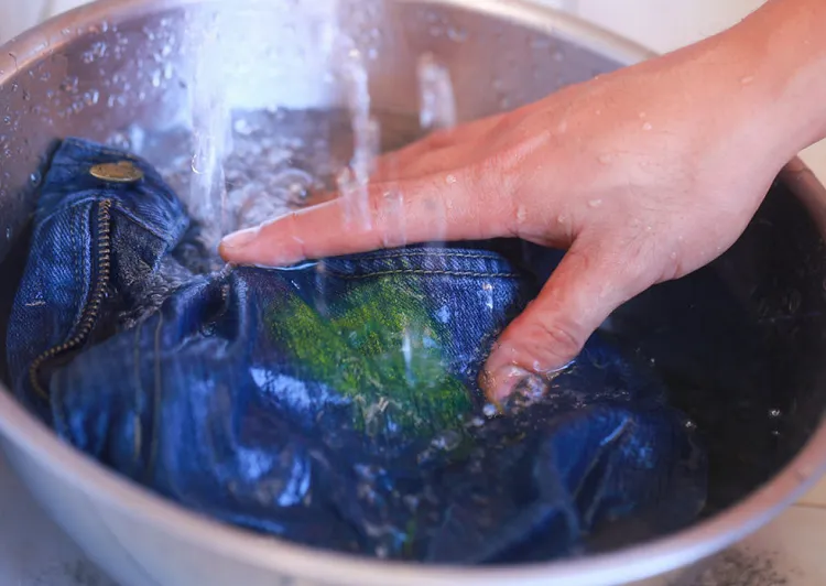 how to remove paint from jeans at home soak in water with detergent