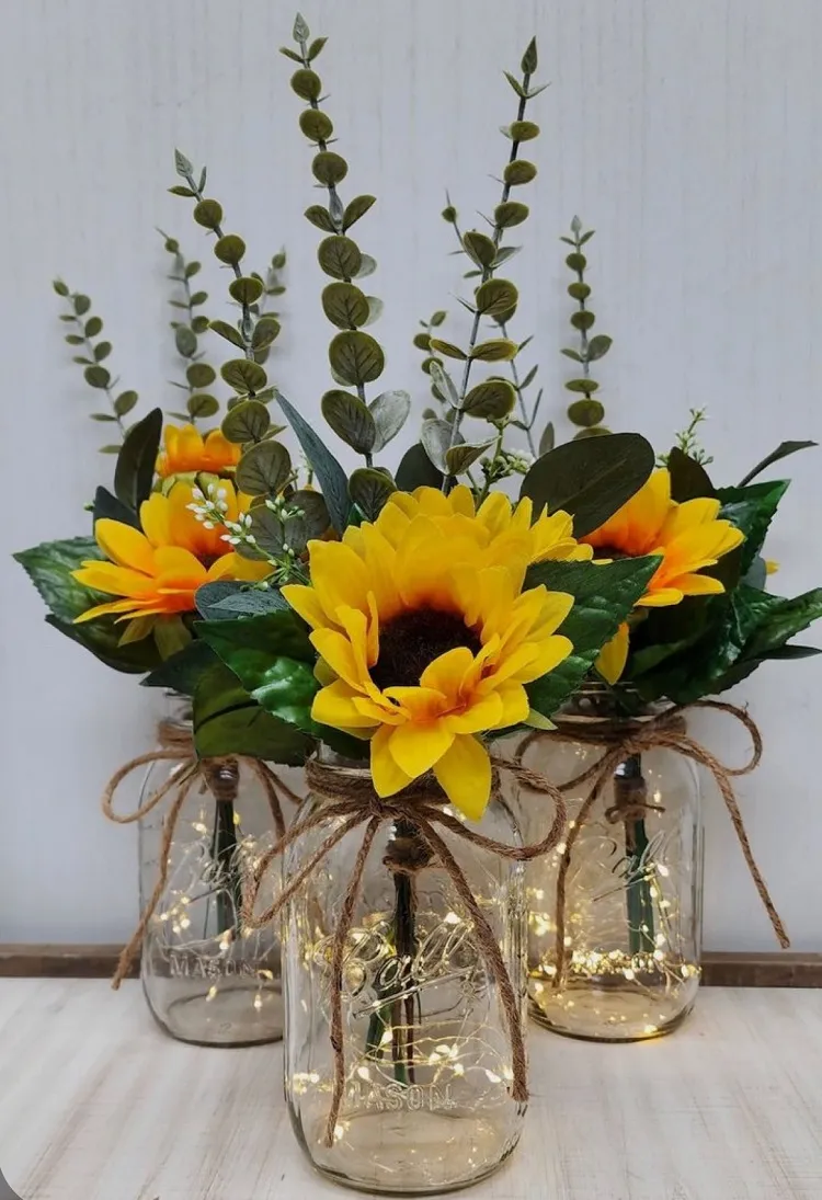 mason jars fall decor ideas 2023 with artificial sunflowers and fairy lights