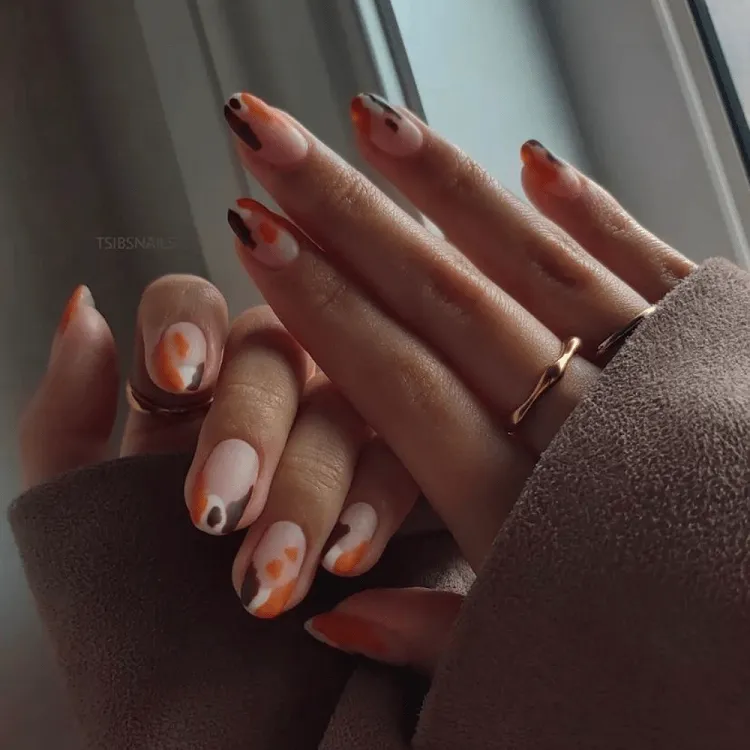 modern minimalist orange white black french tip manicure fall nails 2023