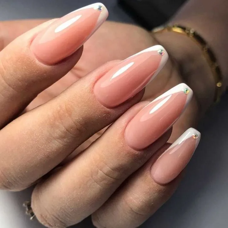 nail trends 2023 v french tips on ballerina shaped nails