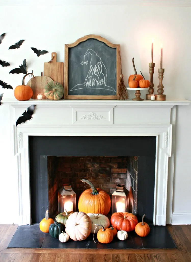 paper bats pumpkin display lanterns chalkboard candelabra halloween decor fireplace mantel 2023