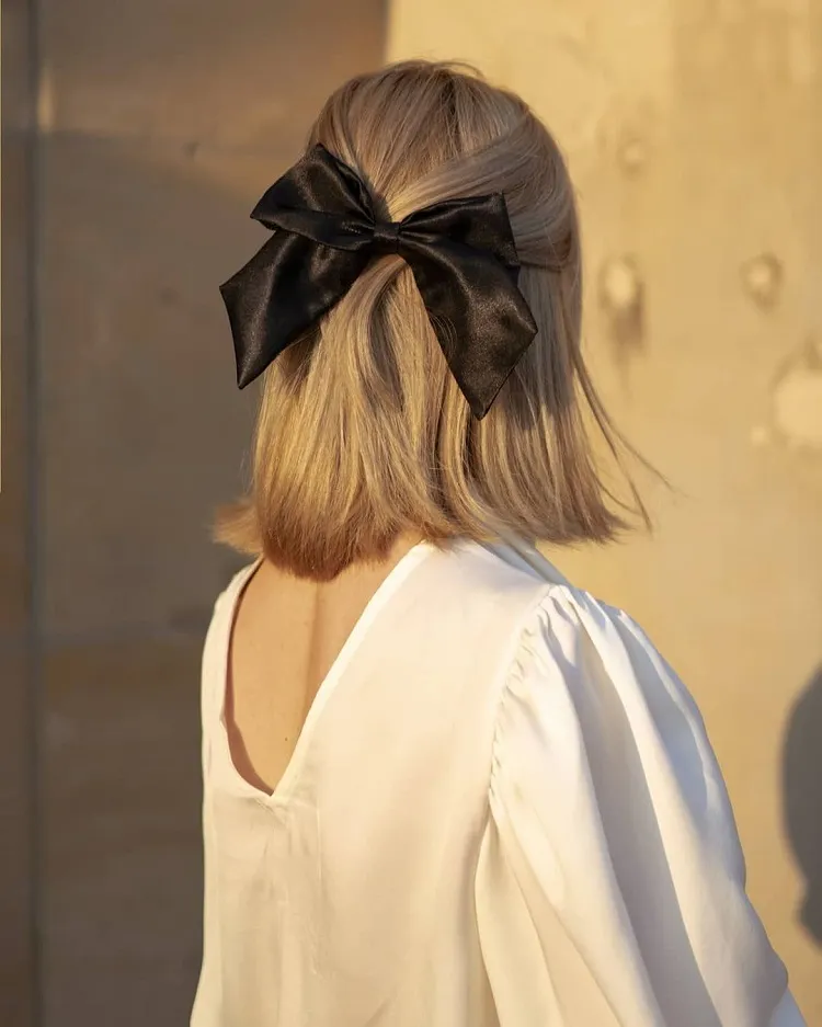 short old money hair with black satin bow