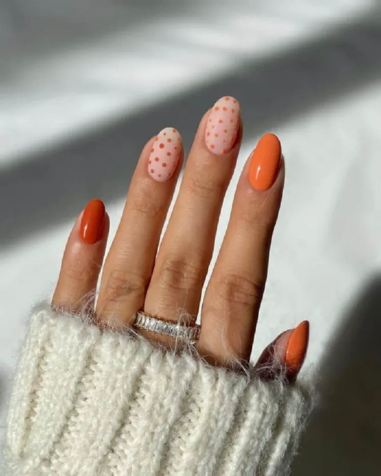 short oval orange polka dots fall nails design 2023