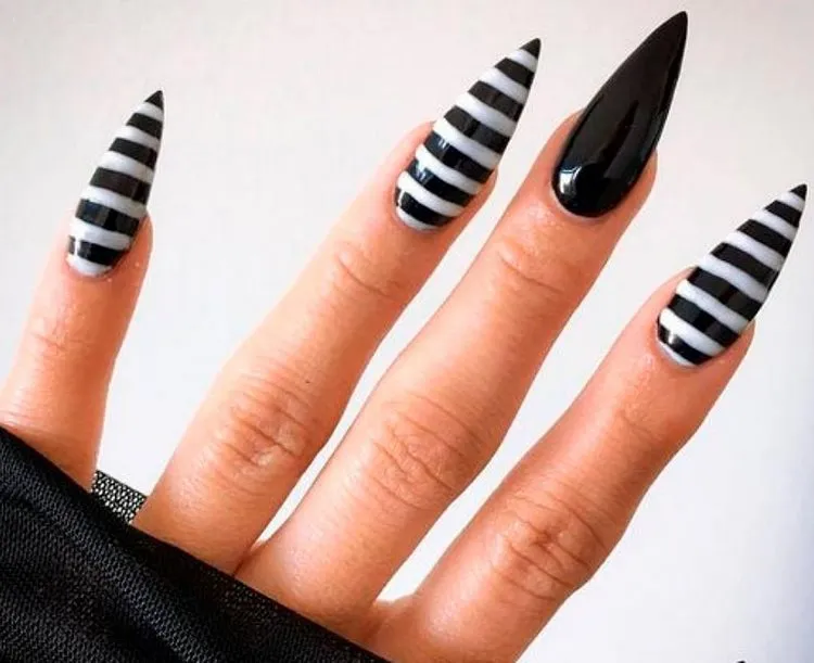 simple halloween nails black and white whitch stockings design