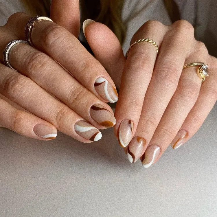 white beige brown swirls simple oval fall nails design 2023