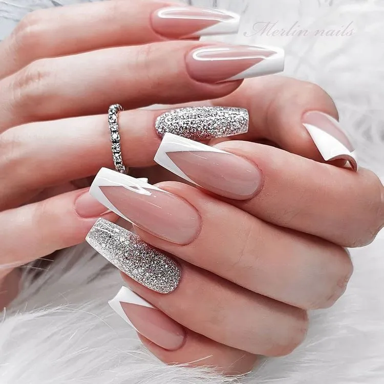 white modern v french tip coffin nails with silver glitter accent nail design