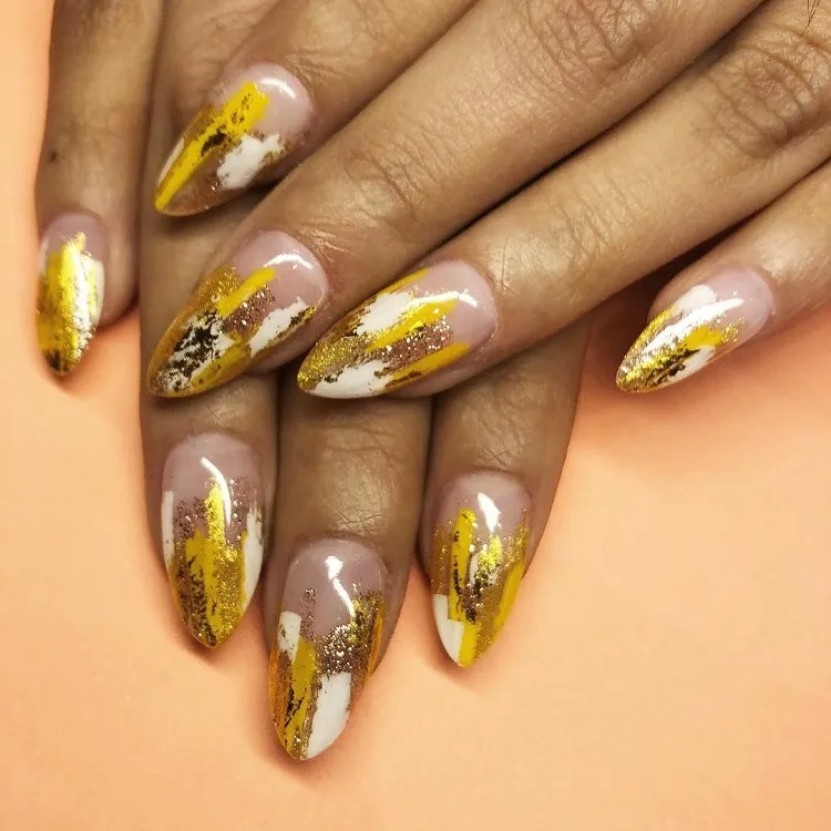 abstract gold foil almond nails fall manicure design trends 2023