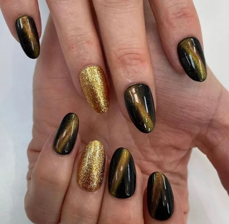 black and gold cat eye nails fall manicure design ideas 2023