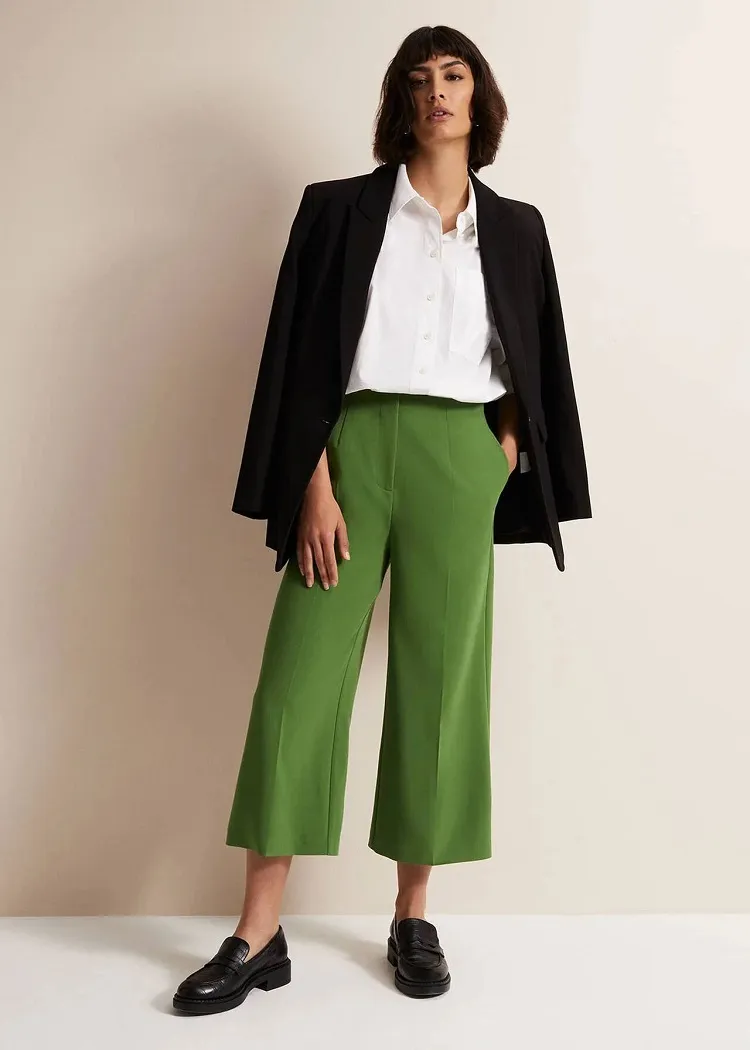 black chunky loafers with green wide leg pants and black blazer fall outfit