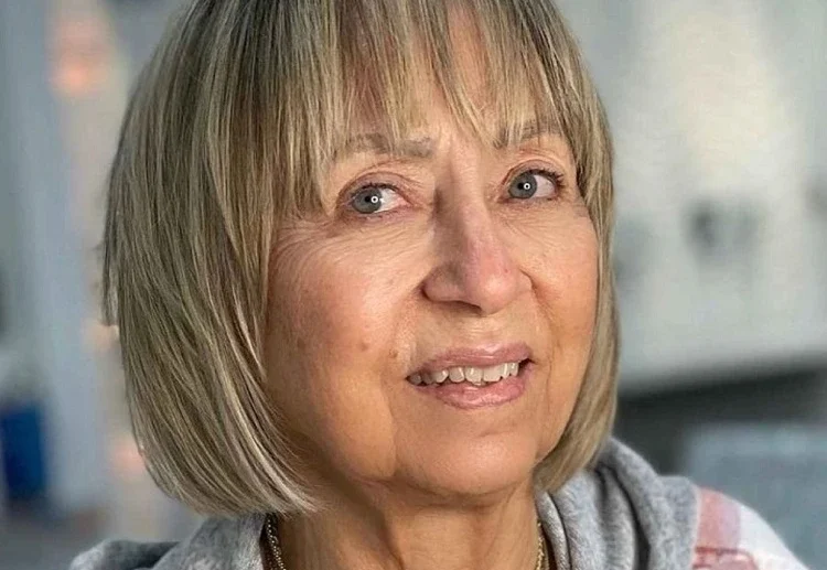 bob haircut with face framing bangs and layers for mature women (1)
