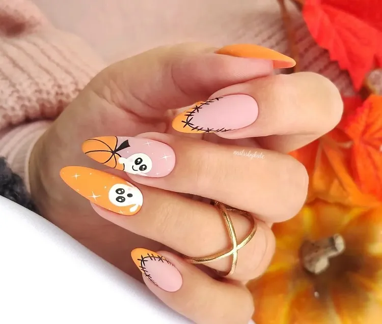 cute almond shaped matte pumpkin nails for halloween