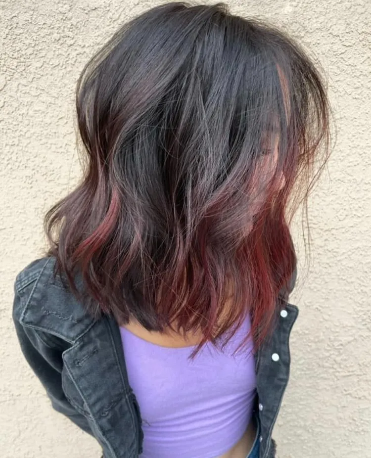 dark red peekaboo highlights on brown hair