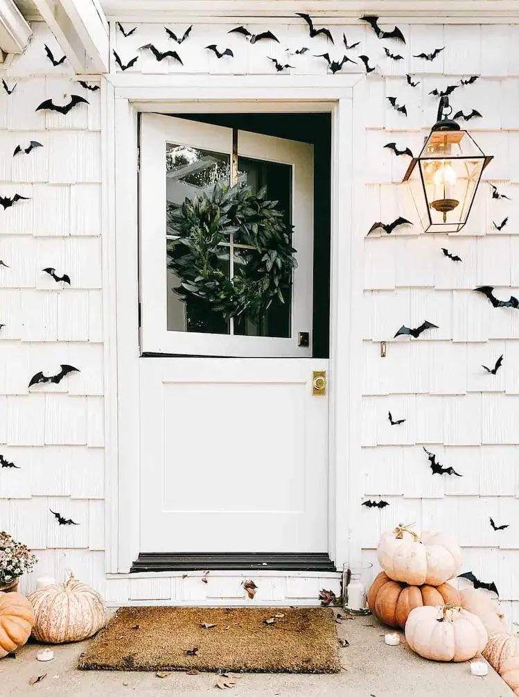 decorate the house entrance with bats