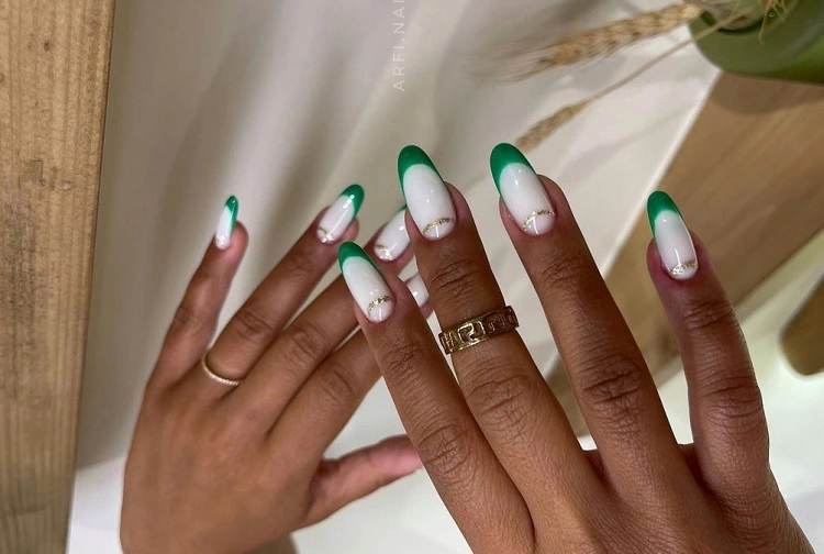 emerald green nails with milky white french tip manicure fall october 2023