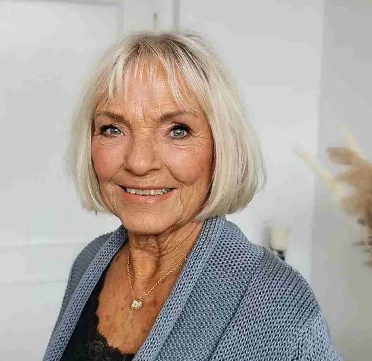 french bob haircut with wispy bangs for women over 60 with thin hair