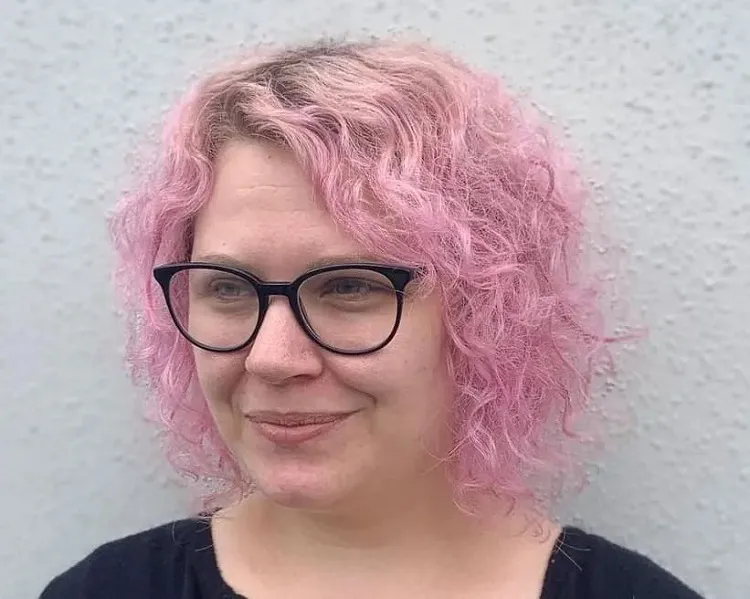fresh daring pink bob for curly hair over 50
