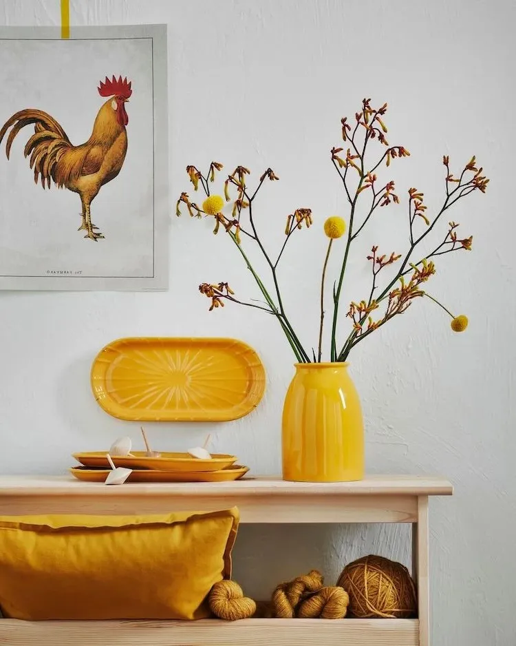 from the kopparbjork collection ikea new products october in mustard yellow with vases and plates decorate