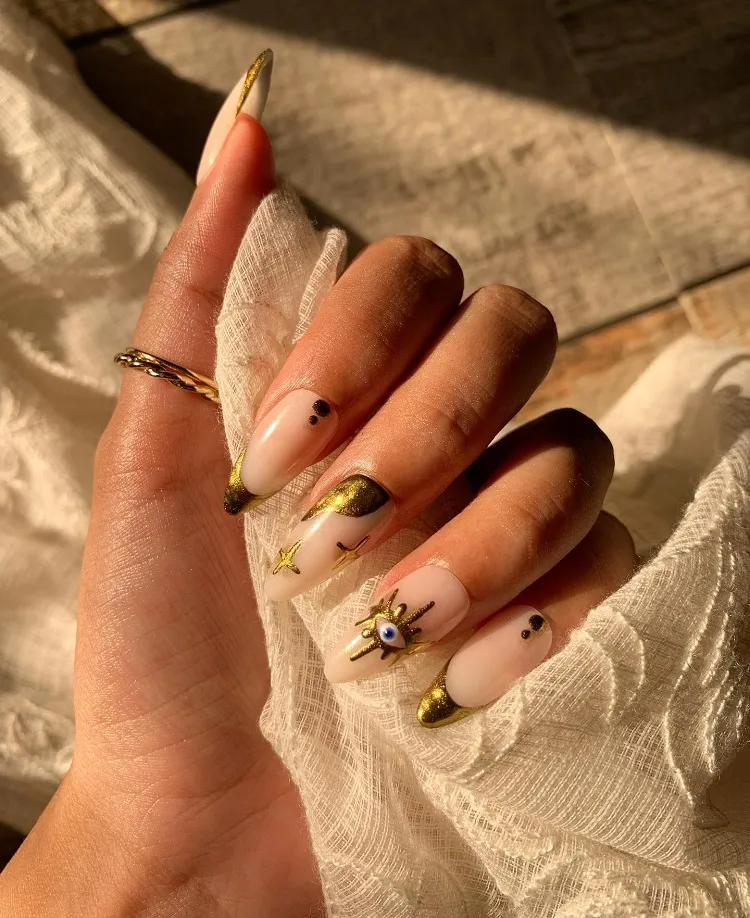 gold celestial nails stars evil eye dots fall manicure