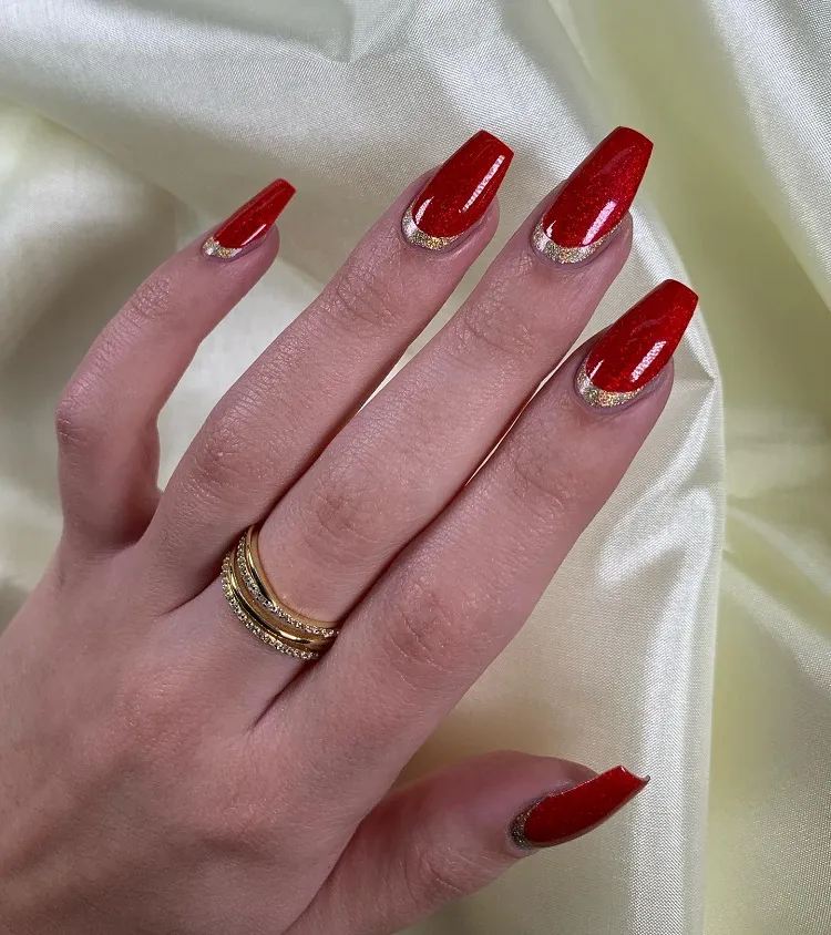 gold glitter reverse french tip cherry red nails