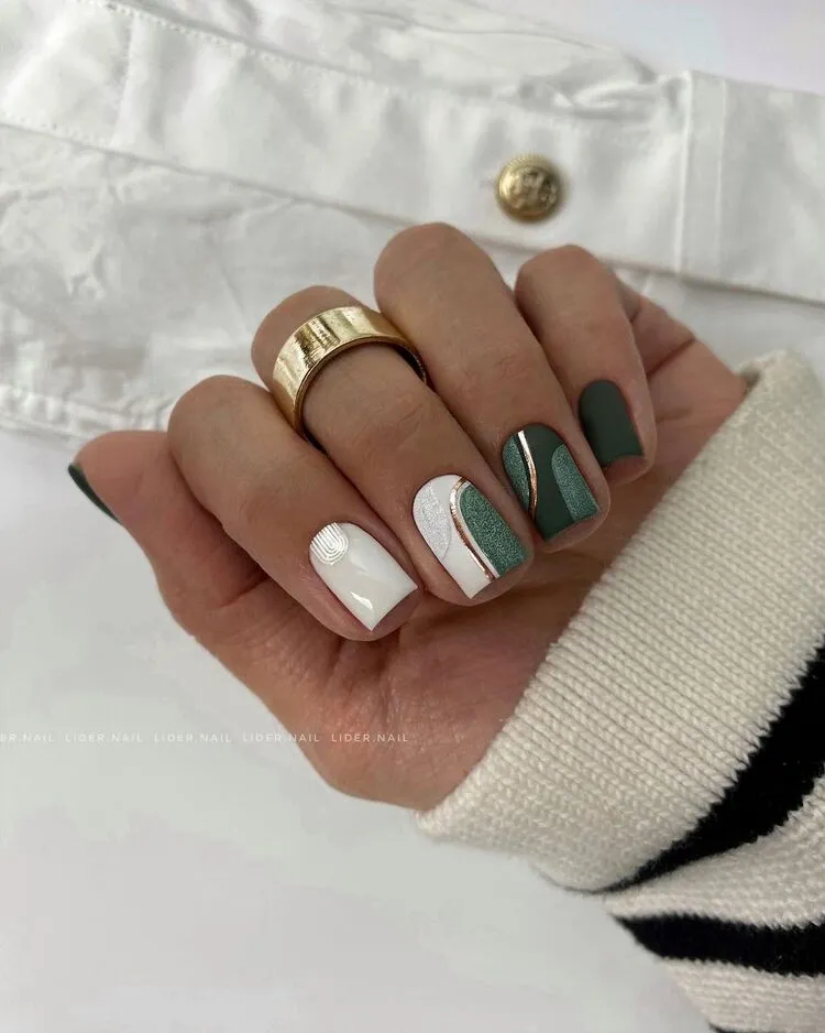 green and white nail art on short nails