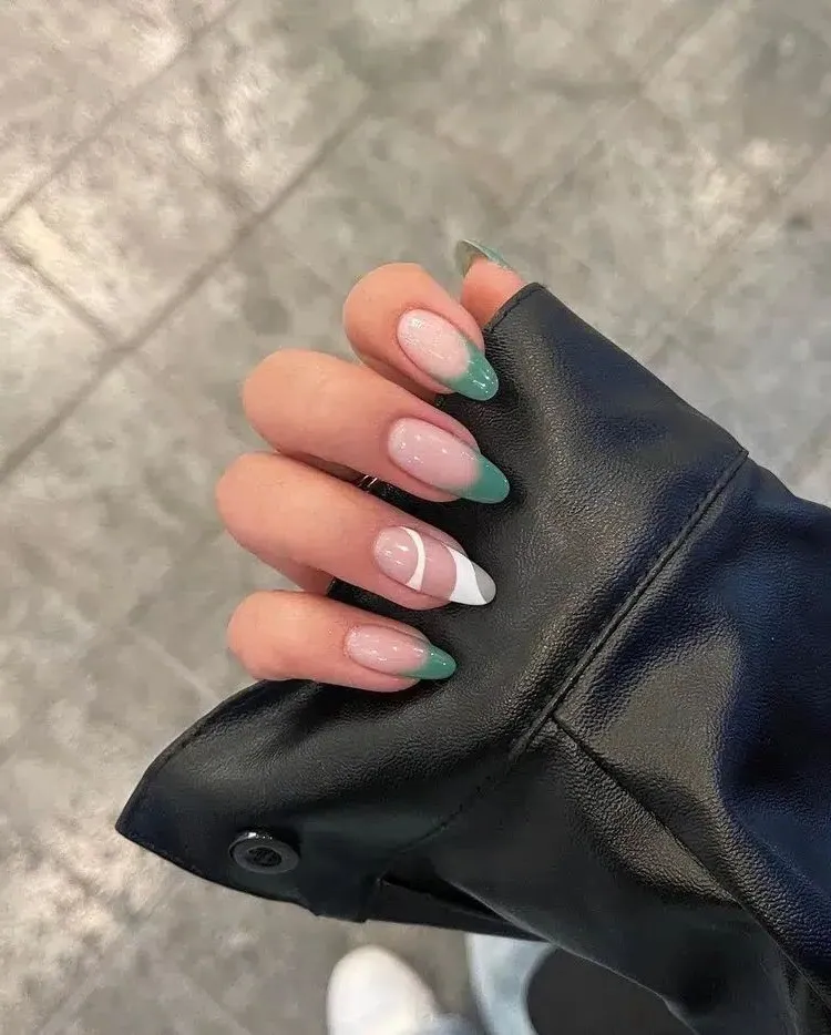 green nail art with white french tip manicure fall 2023