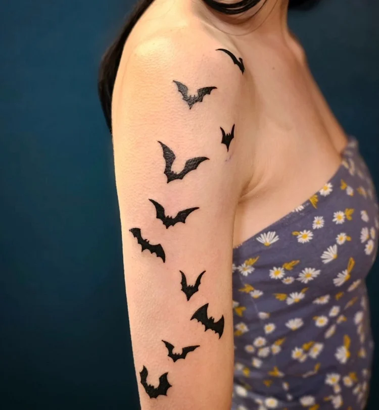 halloween arm tattoos with bats simple
