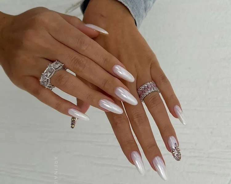 icy white glazed donut nails with rhinestones fall trends 2023
