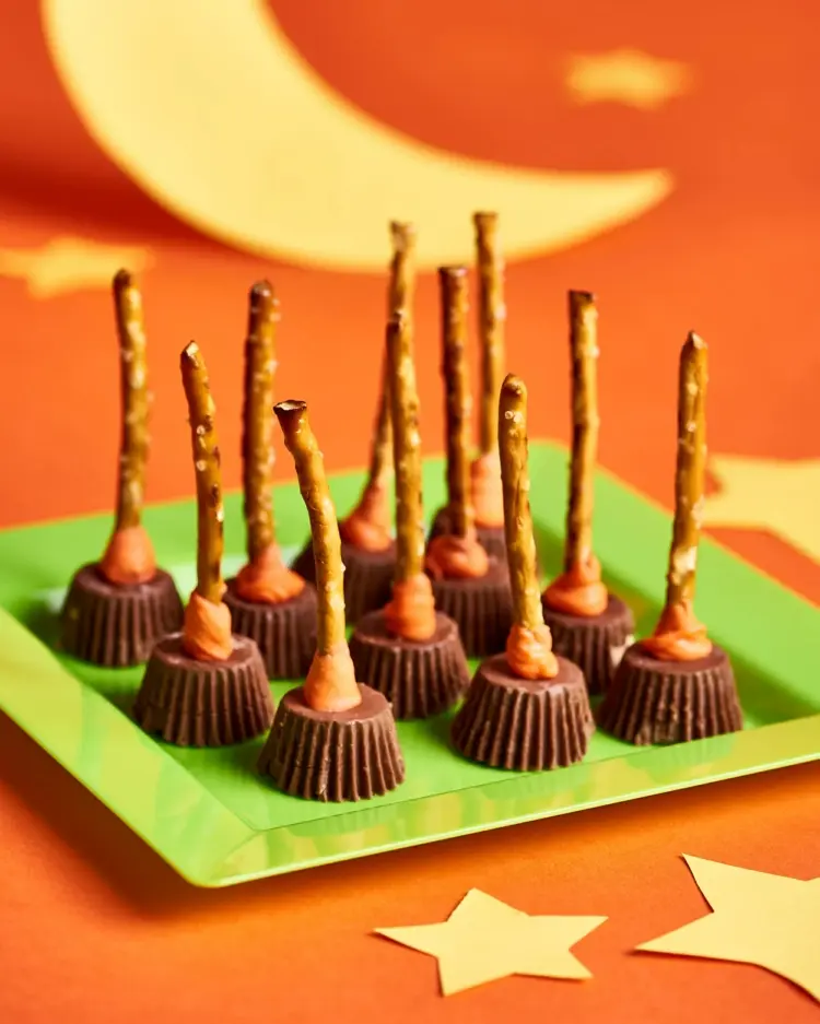 make witch's broom edible chocolate salt sticks and peanut butter
