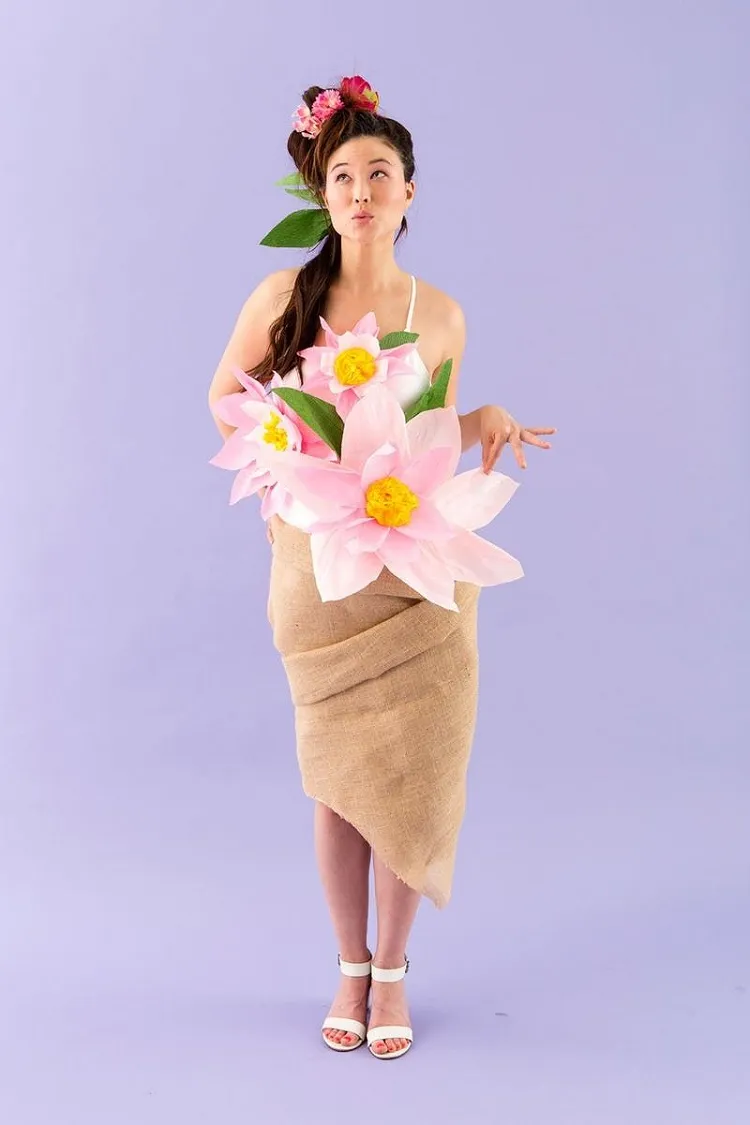 maternity halloween costume concealing belly flower bouquet