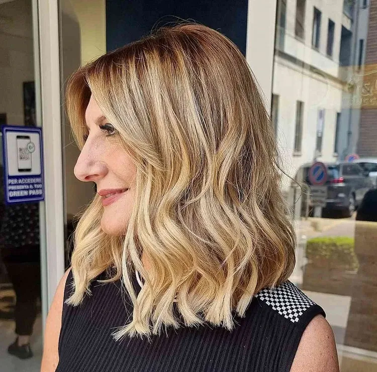 mid length beachy blonde waves for women 50