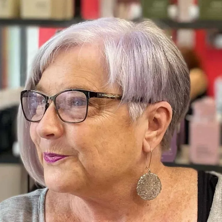modern asymmetrical bob for women 70 with glasses