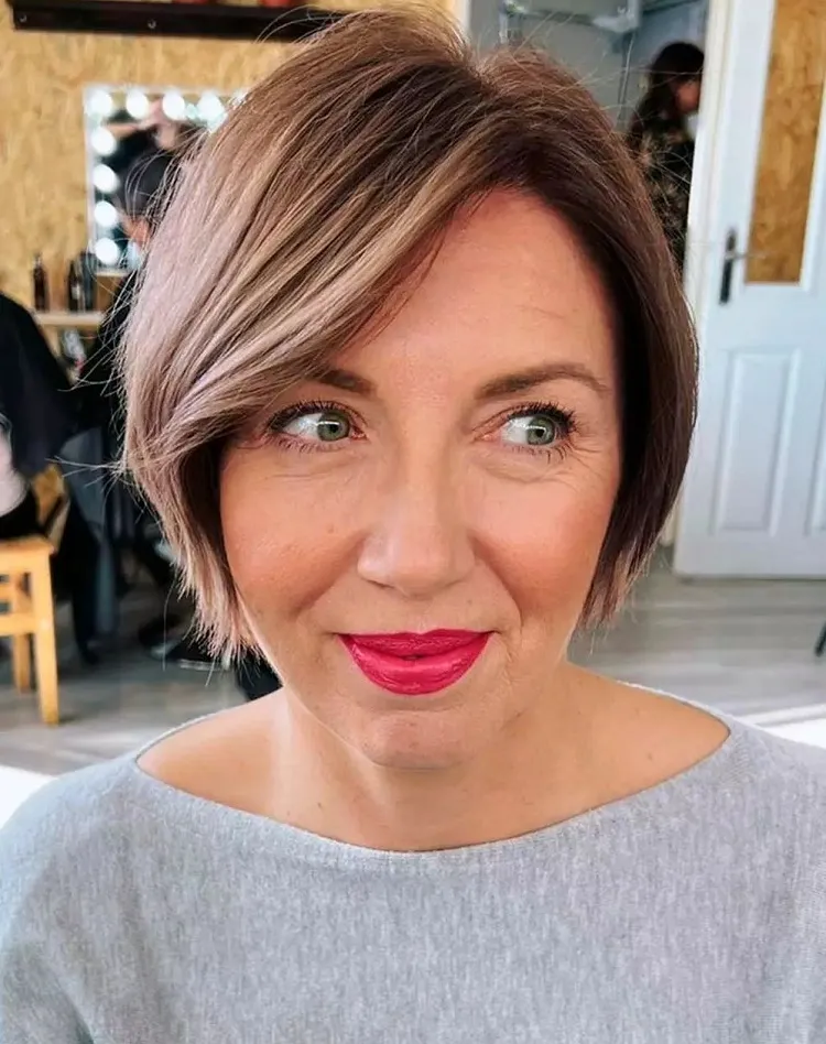 modern short bob with side bangs for women over 50